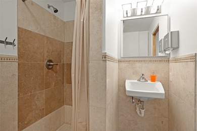 Discover this versatile live-work residence ideally located