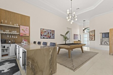 Welcome to this exceptional lakefront residence in the - photo 1