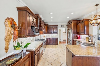 Welcome to luxury coastal living in the highly sought-after - photo 16