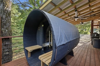 Nestled on 10.086 secluded acres along the Kings River, this - photo 3