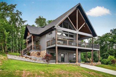A stunning lake-view home built in 2025 overlooking Lake Loch - photo 1