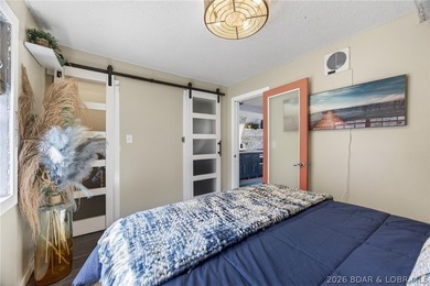 Freshly remodeled, this charming A-frame instantly feels like a - photo 13