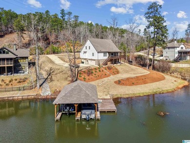 Stunning waterfront home built in 2023 with private boathouse - photo 15