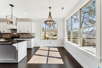 Stunning waterfront home built in 2023 with private boathouse - photo 30