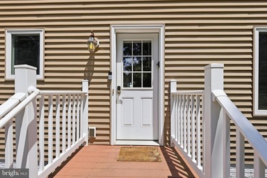 Welcome to a waterfront retreat where timeless coastal living - photo 3