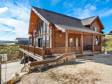 Custom log home nestled at the end of a quiet Cul-de-sac on two - photo 1