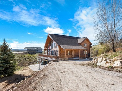 Custom log home nestled at the end of a quiet Cul-de-sac on two - photo 2