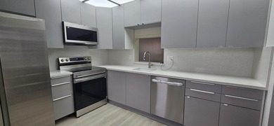 55+ Community .Wonderful View of Pool Area. Lg 2/2 remodeled - photo 1