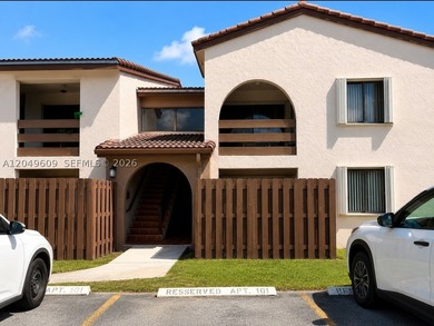 Welcome to this spacious 2-bedroom, 2-bathroom first-floor unit - photo 1