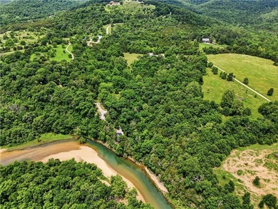 Secluded on 32.36 acres along the Kings River, this - photo 2