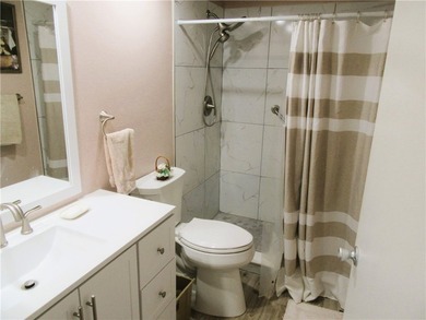 NEW PRICE! Clean and bright FIRST FLOOR 2/2 condo in wooded golf - photo 14