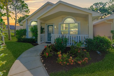 Welcome to this beautifully updated corner villa in the - photo 1