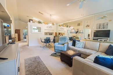 Welcome to this beautifully updated corner villa in the - photo 4