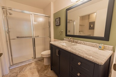 Welcome to this beautifully updated corner villa in the - photo 10