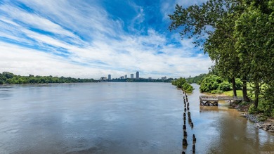 Amazing Riverbend condo custom designed by the renowned Noland