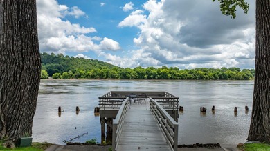 Amazing Riverbend condo custom designed by the renowned Noland