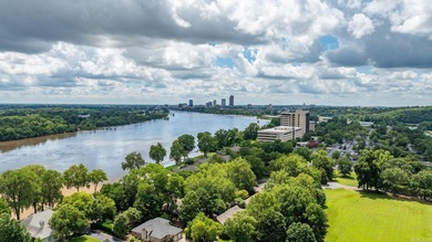 Amazing Riverbend condo custom designed by the renowned Noland