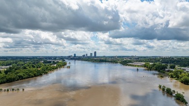 Amazing Riverbend condo custom designed by the renowned Noland