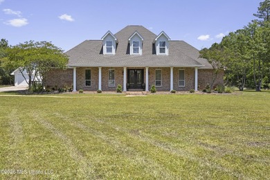 Tucked behind a gated entrance on 5 private acres, this - photo 2