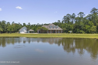 Tucked behind a gated entrance on 5 private acres, this - photo 4