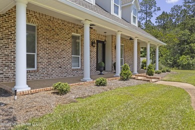 Tucked behind a gated entrance on 5 private acres, this - photo 8