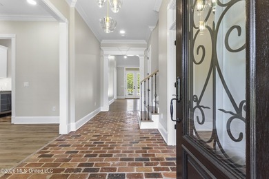 Tucked behind a gated entrance on 5 private acres, this - photo 10