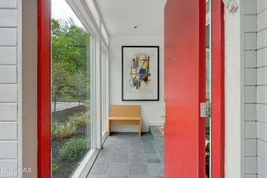 A striking modern retreat where architecture and landscape exist - photo 5