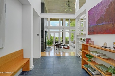 A striking modern retreat where architecture and landscape exist - photo 7