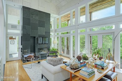 A striking modern retreat where architecture and landscape exist - photo 10