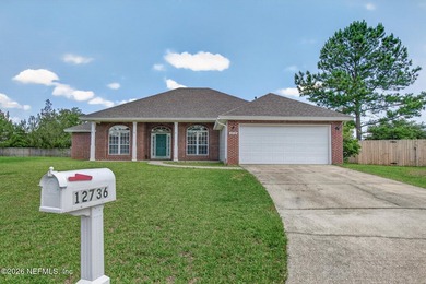 Welcome to this beautifully maintained 4-bedroom, 2-bathroom - photo 1