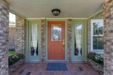 Nestled on 1.33 acres of picturesque lakefront property, this - photo 3