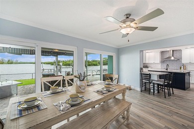 WATERFRONT RESORT STYLE LIVING!!  Step through the front door & - photo 3
