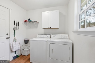 This completely remodeled 4-bedroom, 3.5-bathroom home sits off - photo 15