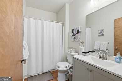 This completely remodeled 4-bedroom, 3.5-bathroom home sits off - photo 32