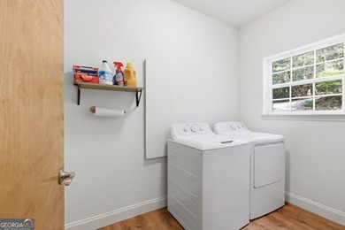 This completely remodeled 4-bedroom, 3.5-bathroom home sits off - photo 39