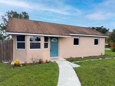 752 Orchid Dr is a 1-story Royal Palm Beach home, gives an open - photo 1
