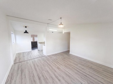 752 Orchid Dr is a 1-story Royal Palm Beach home, gives an open - photo 6