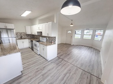 752 Orchid Dr is a 1-story Royal Palm Beach home, gives an open - photo 9