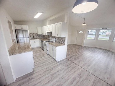 752 Orchid Dr is a 1-story Royal Palm Beach home, gives an open - photo 10