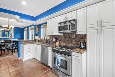 Are you looking for a renovated 1st floor corner unit condo in - photo 9