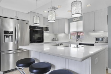 Beautifully remodeled 2-bedroom, 2-bath condominium offers one - photo 3