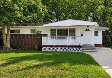 This charming home shines with new carpet, new LVP flooring, and - photo 1