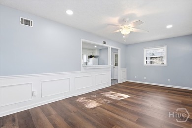 This charming home shines with new carpet, new LVP flooring, and - photo 6