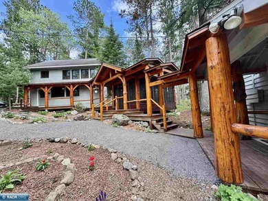 Charming 3 Bedroom Retreat Amidst Towering Pines! This - photo 2