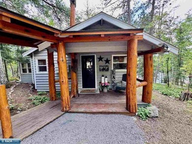 Charming 3 Bedroom Retreat Amidst Towering Pines! This - photo 4