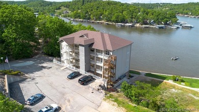 ELEVATOR and NO STEPS UNIT! Rarely used Turn-Key Lakefront - photo 33