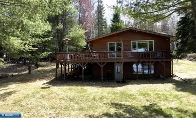 Experience lake life at its finest with this charming 3-bedroom - photo 1