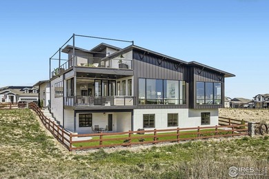 Welcome to elevated Colorado living at its finest. Perched above - photo 2