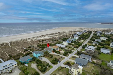 This stunning oceanfront home in Emerald Isle, boasts 6 bedrooms