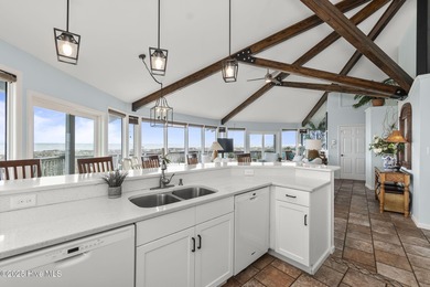 This stunning oceanfront home in Emerald Isle, boasts 6 bedrooms